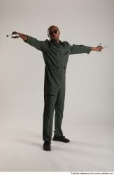 ERIC PILOT STANDING POSE WITH GUNS